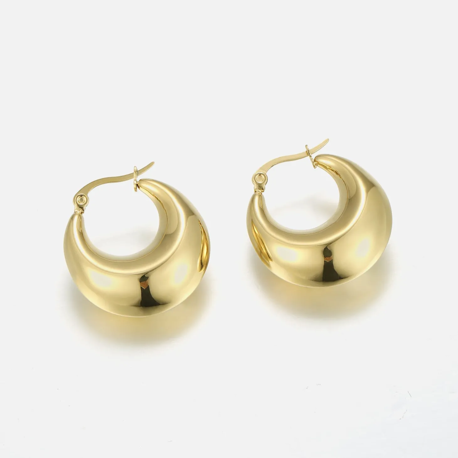 chunky_oorbellen_goud_0.webp Chunky oorbellen goud