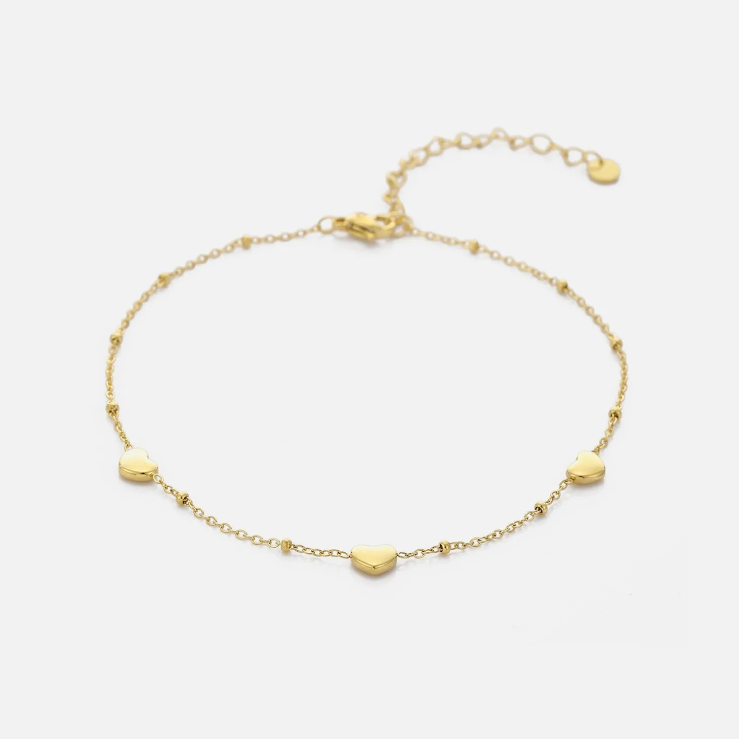 enkelband_drie_bollen_har_0.webp Enkelband drie bollen hartjes goud